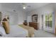 Comfortable bedroom with king-size bed and balcony access at 9051 Treasure Trove Ln # 307, Kissimmee, FL 34747