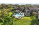 Community pool and surrounding landscape at 976 Leeward Pl # 102, Altamonte Springs, FL 32714
