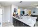 Kitchen with granite countertops, dark cabinets, and breakfast bar at 976 Leeward Pl # 102, Altamonte Springs, FL 32714
