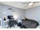 Bedroom with a bed, desk, and ceiling fan at 976 Leeward Pl # 102, Altamonte Springs, FL 32714