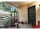 Screened porch with seating and storage at 976 Leeward Pl # 102, Altamonte Springs, FL 32714