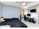 Bedroom with double bed, workspace, and ceiling fan at 976 Leeward Pl # 102, Altamonte Springs, FL 32714
