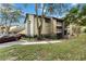 Two-story building with balconies and landscaping at 976 Leeward Pl # 102, Altamonte Springs, FL 32714