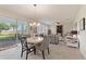 Bright dining area with view to backyard and golf course at 1423 Bunker Dr, Davenport, FL 33896