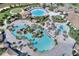 Lazy river and water features in community pool at 1423 Bunker Dr, Davenport, FL 33896