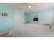 Bedroom with white bedding and ceiling fan at 1423 Bunker Dr, Davenport, FL 33896