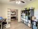 Bright home office features built-in shelving and plenty of workspace at 1927 Partin Terrace Rd, Kissimmee, FL 34744