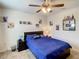 Baseball-themed bedroom with a double bed and decorative wall art at 1927 Partin Terrace Rd, Kissimmee, FL 34744