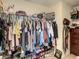 Large walk-in closet with ample hanging space and shelving at 1927 Partin Terrace Rd, Kissimmee, FL 34744