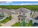 Aerial view of two-story house with solar panels at 1927 Partin Terrace Rd, Kissimmee, FL 34744