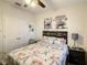 Bedroom with a queen-size bed, and a double door closet at 1927 Partin Terrace Rd, Kissimmee, FL 34744