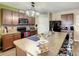 L-shaped kitchen with island and seating area at 1927 Partin Terrace Rd, Kissimmee, FL 34744