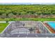 Aerial view of property showcasing solar panels and pool area at 1927 Partin Terrace Rd, Kissimmee, FL 34744