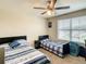 Cozy bedroom with two beds, offering a comfortable and functional space at 1927 Partin Terrace Rd, Kissimmee, FL 34744