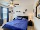 Baseball-themed bedroom with a double bed and decorative wall art at 1927 Partin Terrace Rd, Kissimmee, FL 34744