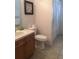 Neat bathroom with single vanity and shower at 236 Paradise Woods Ct, Davenport, FL 33896