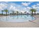 Relaxing community pool with plenty of lounge chairs at 2601 Palisade Blvd, Kissimmee, FL 34741