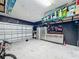 Garage with overhead storage, workbench, and bicycle at 2605 Yountville Ave, Kissimmee, FL 34741