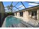 Inviting screened pool and spa with plenty of lounging space at 2904 Sunset Retreat Ct, Kissimmee, FL 34747