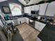 Modern kitchen featuring stainless steel appliances and granite countertops at 325 Sonoma Valley Cir, Orlando, FL 32835