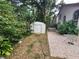 Backyard with patio, shed and lush greenery at 325 Sonoma Valley Cir, Orlando, FL 32835