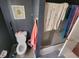 Clean bathroom with a toilet, tub and shower at 325 Sonoma Valley Cir, Orlando, FL 32835