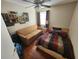 Bedroom with hardwood floors, sofa and a bed at 325 Sonoma Valley Cir, Orlando, FL 32835