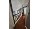 Upper floor hallway with dark gray walls and dark wood floors at 325 Sonoma Valley Cir, Orlando, FL 32835