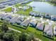 Aerial view showing home's location in a community with a lake and amenities at 4963 Royal Point Ave, Kissimmee, FL 34746