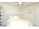Charming bedroom with a white bookcase and decorative wall art at 4963 Royal Point Ave, Kissimmee, FL 34746
