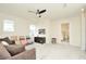 Spacious bonus room with comfortable seating and built-in shelving at 4963 Royal Point Ave, Kissimmee, FL 34746