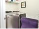 Laundry room with washer, dryer, and shelving at 4963 Royal Point Ave, Kissimmee, FL 34746