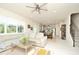 Open floor plan with living room, kitchen, and dining area at 4963 Royal Point Ave, Kissimmee, FL 34746