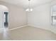 Empty dining room with tile floors and neutral walls at 540 Genoa Dr, Poinciana, FL 34759