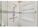 Walk-in shower with modern fixtures and a window at 540 Genoa Dr, Poinciana, FL 34759