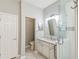Updated bathroom with a walk-in shower and double vanity at 540 Genoa Dr, Poinciana, FL 34759