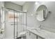 Updated bathroom with walk-in shower and modern vanity at 540 Genoa Dr, Poinciana, FL 34759