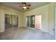 Covered lanai with access to the backyard at 540 Genoa Dr, Poinciana, FL 34759