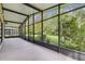 Spacious screened porch offering views of the backyard at 540 Genoa Dr, Poinciana, FL 34759
