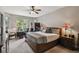 Main bedroom with large windows and built-in home office at 561 Sienna Dr, Poinciana, FL 34759