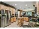 Well-equipped kitchen with stainless steel appliances and ample cabinetry at 561 Sienna Dr, Poinciana, FL 34759