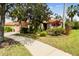 Beautiful home with manicured landscaping and walkway at 561 Sienna Dr, Poinciana, FL 34759