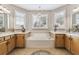 Large bathroom with soaking tub, double vanity and separate shower at 561 Sienna Dr, Poinciana, FL 34759