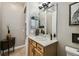 Simple bathroom with single vanity and updated fixtures at 561 Sienna Dr, Poinciana, FL 34759