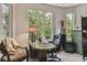Home office with large windows and built-in desk at 561 Sienna Dr, Poinciana, FL 34759