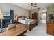 Spacious bedroom with large windows and an ensuite bathroom at 561 Sienna Dr, Poinciana, FL 34759