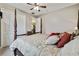Cozy bedroom with a king-size bed and access to the backyard at 561 Sienna Dr, Poinciana, FL 34759
