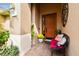 Charming front porch with a bench and decorative accents at 561 Sienna Dr, Poinciana, FL 34759