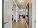 Bright hallway with tile flooring, leading to a spacious bedroom at 561 Sienna Dr, Poinciana, FL 34759