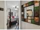 Spacious bedroom with a king-size bed and a view of the kitchen at 561 Sienna Dr, Poinciana, FL 34759